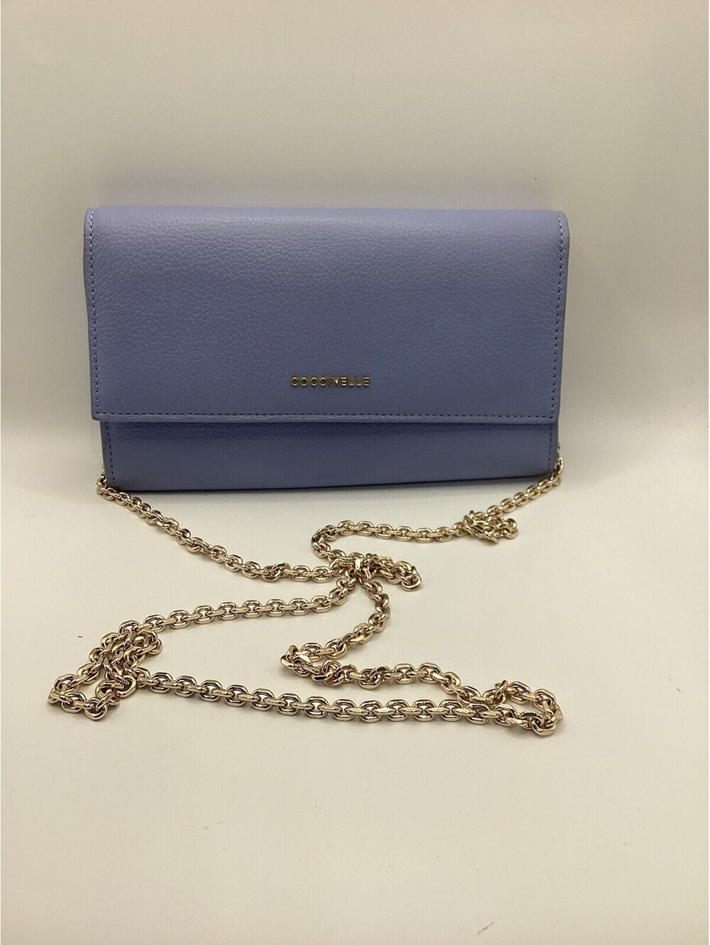coccinelle baby blue crossbody with gold strap chain